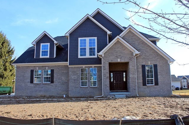 view of front of home with brick siding