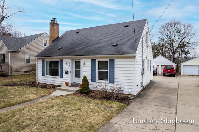 view of front of property with roof with shingles, a chimney, a garage, an outdoor structure, and a front lawn