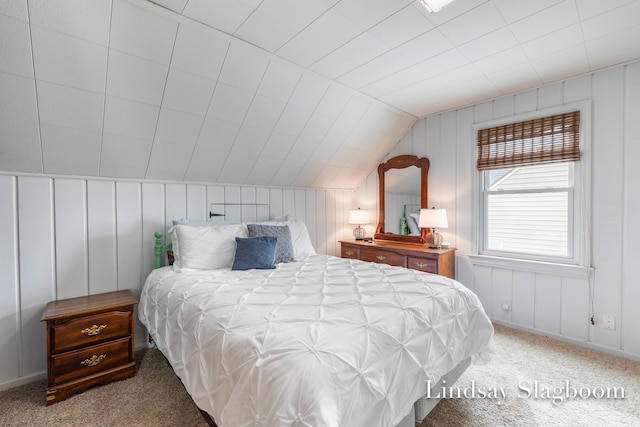 carpeted bedroom featuring vaulted ceiling