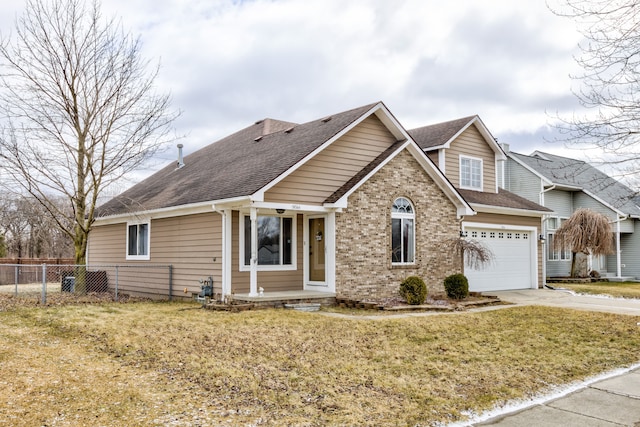 view of front of house featuring brick siding, a shingled roof, fence, a garage, and driveway