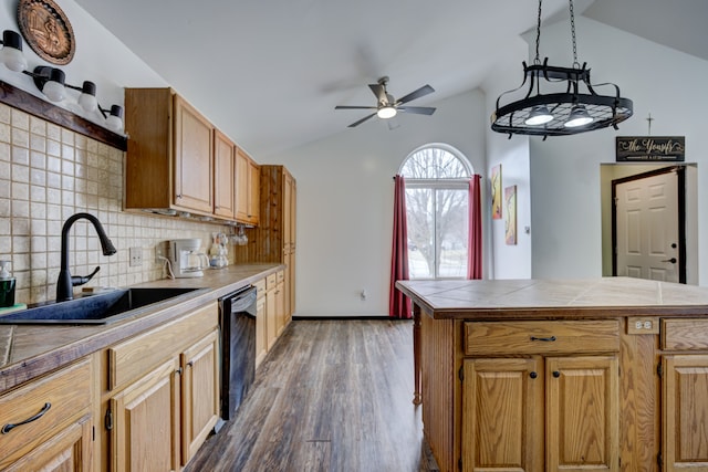 kitchen with tasteful backsplash, lofted ceiling, black dishwasher, dark wood-style floors, and a sink