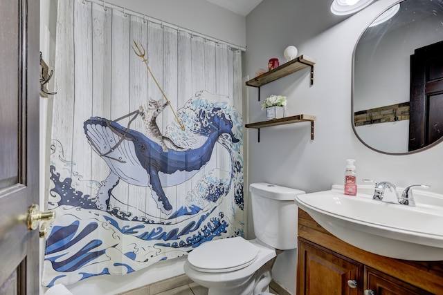 bathroom featuring curtained shower, toilet, and vanity