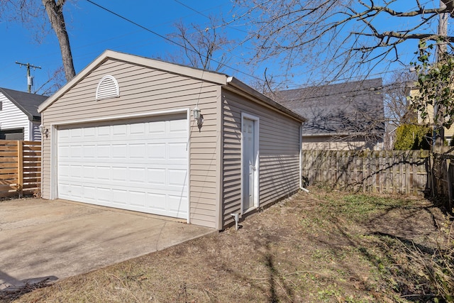 detached garage with fence