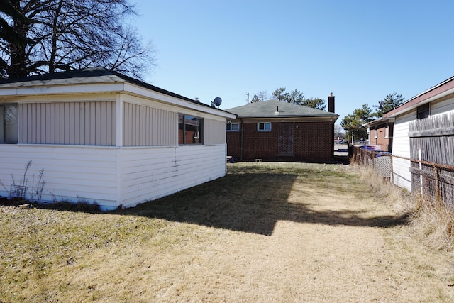 view of yard with fence