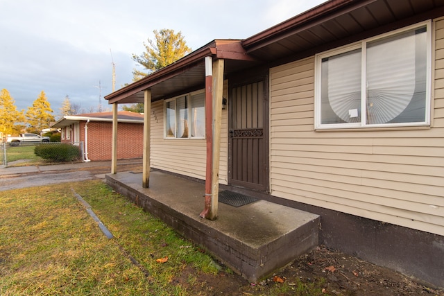 view of property exterior featuring fence