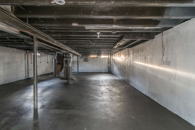 unfinished basement with heating unit