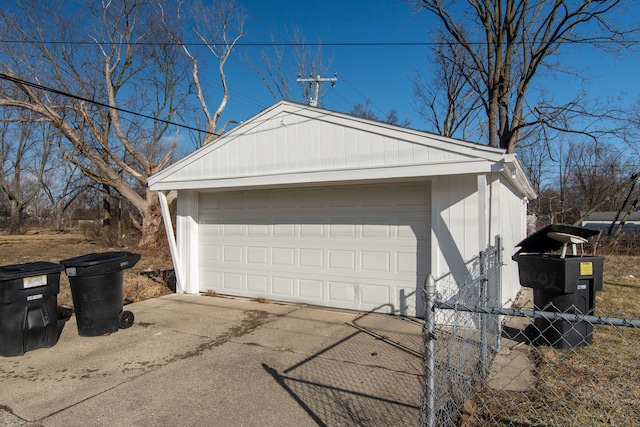 detached garage with fence