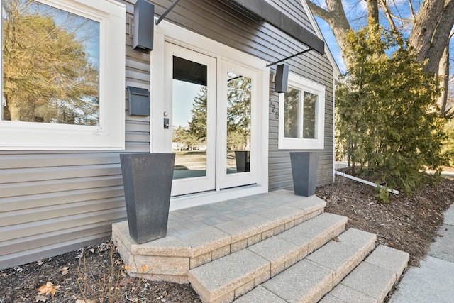 property entrance featuring french doors