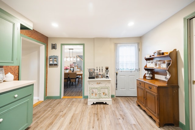 entrance foyer with light wood-style flooring, recessed lighting, and baseboards