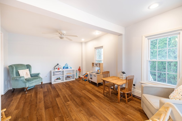 living area featuring recessed lighting, wood finished floors, and a wealth of natural light