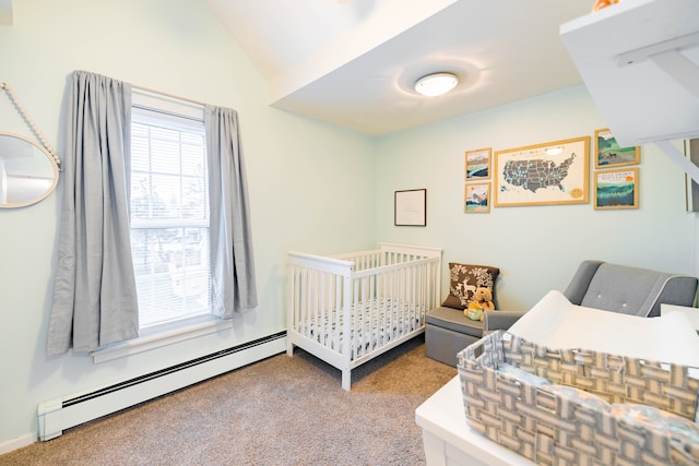 carpeted bedroom with a baseboard heating unit, a nursery area, and vaulted ceiling