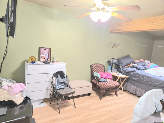 bedroom featuring light wood-style flooring and ceiling fan