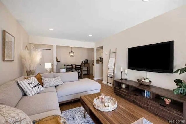 living area featuring recessed lighting and wood finished floors