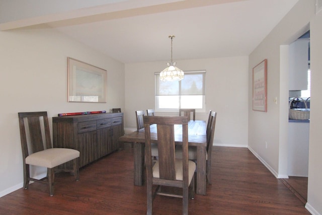 dining area with dark wood-type flooring, visible vents, and baseboards