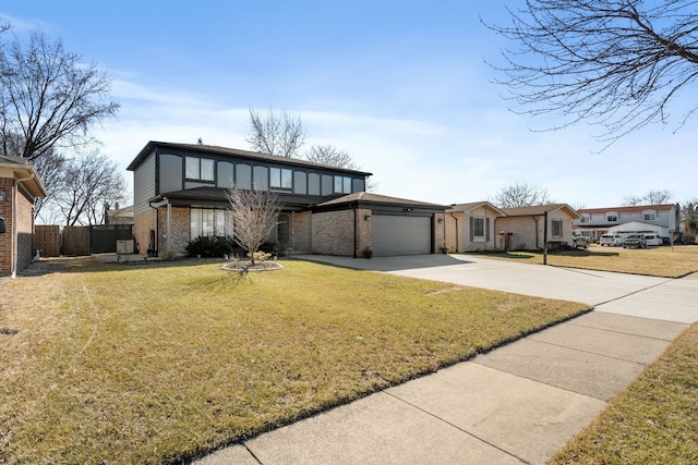 mid-century inspired home featuring a front lawn, driveway, fence, a garage, and brick siding