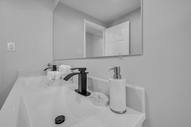 interior details featuring a sink