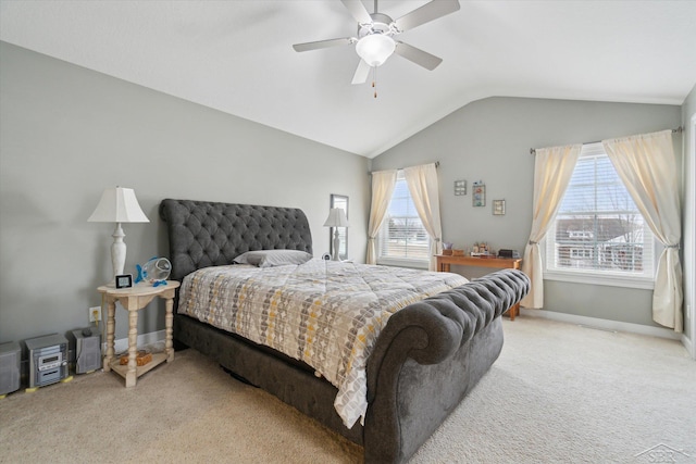 bedroom featuring baseboards, a ceiling fan, carpet, and vaulted ceiling