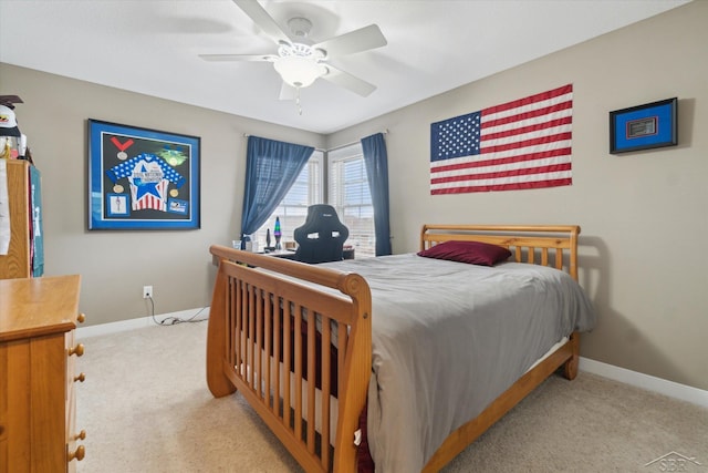 bedroom featuring carpet flooring, ceiling fan, and baseboards