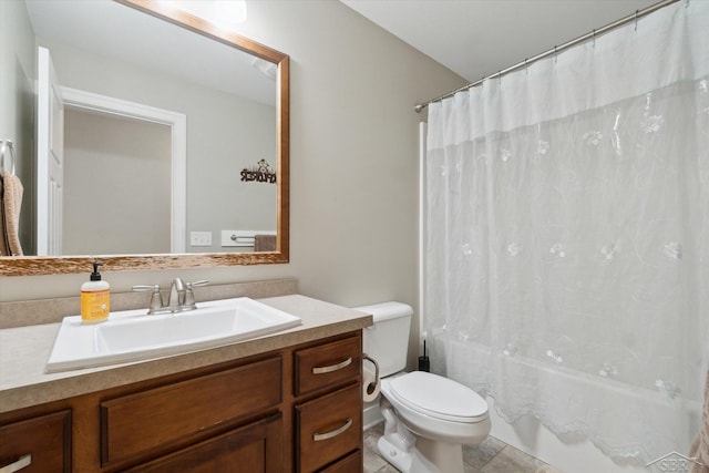 full bath featuring vanity, shower / bath combination with curtain, toilet, and tile patterned floors