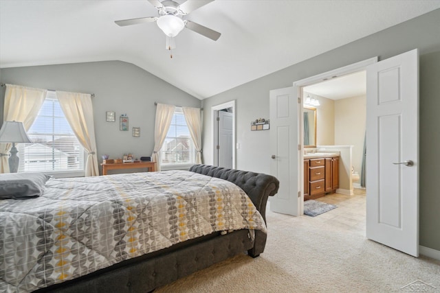 bedroom featuring baseboards, light colored carpet, ceiling fan, and vaulted ceiling