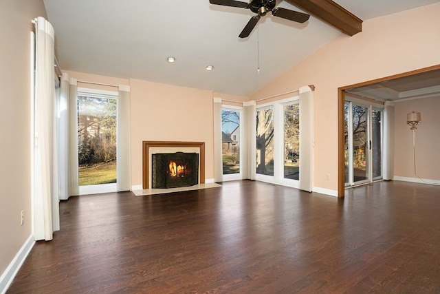 unfurnished living room with a fireplace with flush hearth, lofted ceiling with beams, baseboards, and wood finished floors