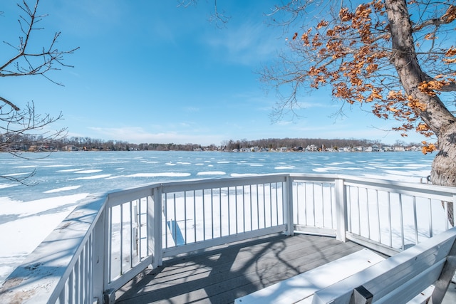 view of snow covered deck