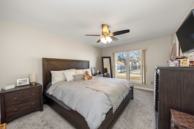 bedroom with baseboards, light colored carpet, and ceiling fan