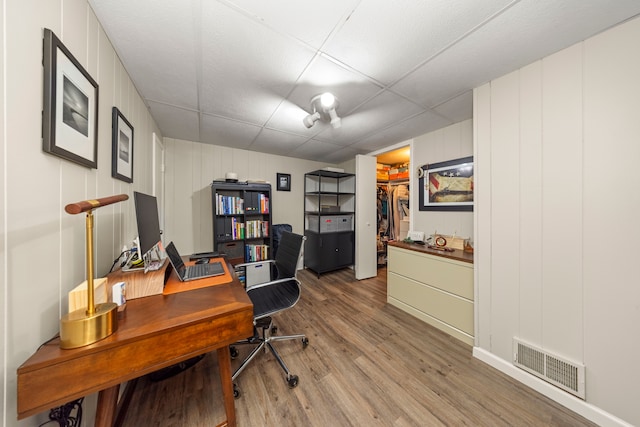 home office with visible vents and light wood-type flooring