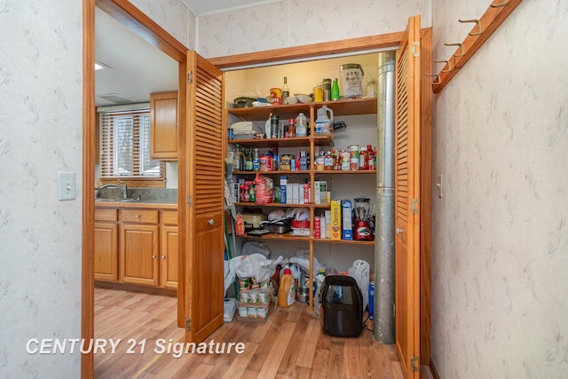 storage area featuring a sink