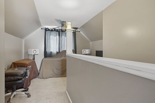 carpeted bedroom featuring vaulted ceiling