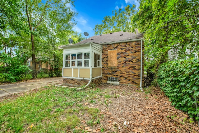 5984 Courville St, Detroit, MI 48224 - exterior space featuring brick siding