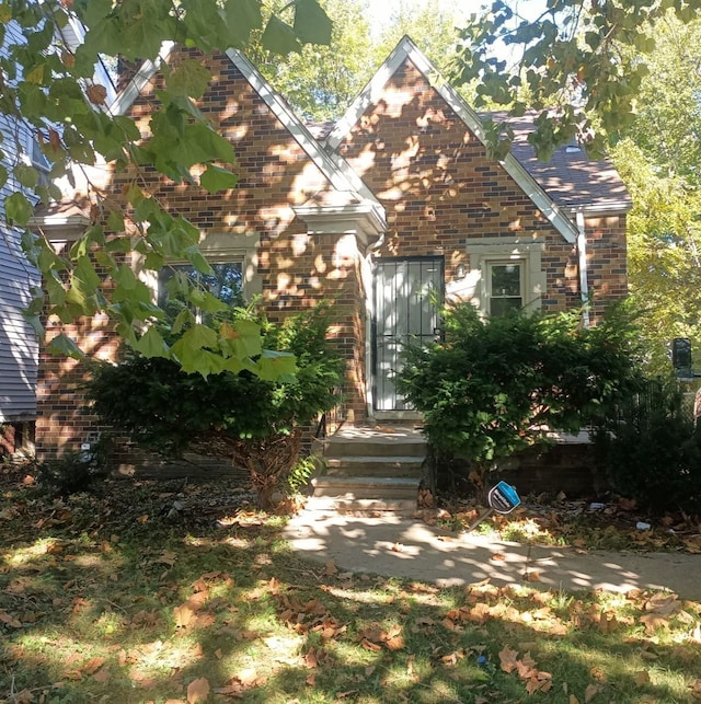 view of front of property with brick siding