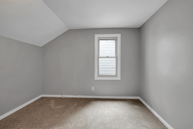 5984 Courville St, Detroit, MI 48224 - bonus room featuring carpet flooring, baseboards, and lofted ceiling
