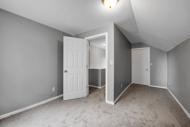 5984 Courville St, Detroit, MI 48224 - bonus room with lofted ceiling, baseboards, and carpet floors