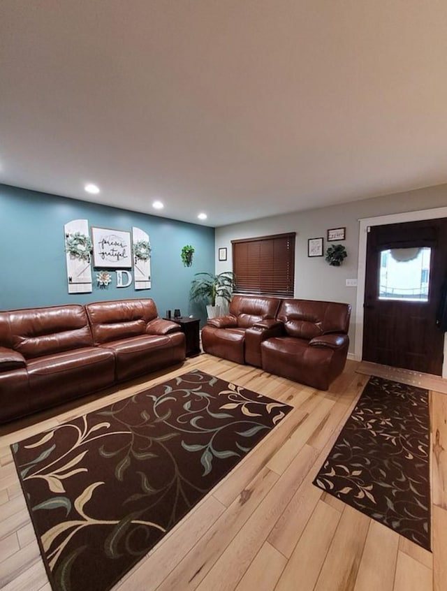 living room featuring recessed lighting and wood finished floors