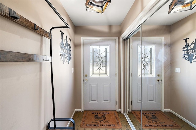 entrance foyer featuring baseboards