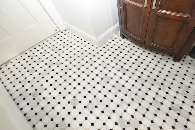 interior details featuring tile patterned floors