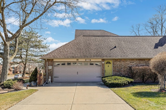 view of front of home with driveway, brick siding, and roof with shingles