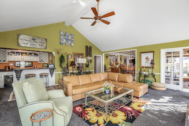 carpeted living area featuring beam ceiling, high vaulted ceiling, bar area, and a ceiling fan