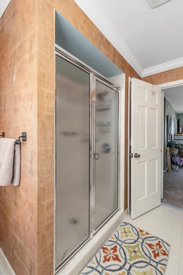 full bathroom with a shower stall, visible vents, tile patterned floors, and ornamental molding