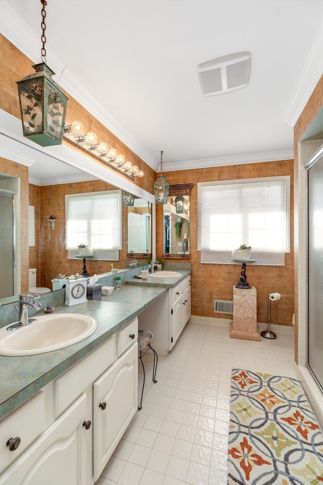 full bath with visible vents, a stall shower, vanity, and ornamental molding