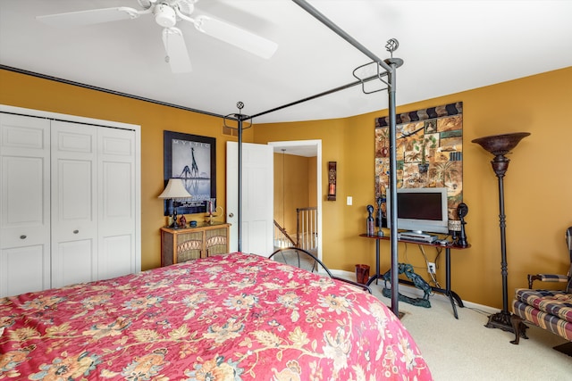 bedroom with a closet, ceiling fan, baseboards, and carpet floors