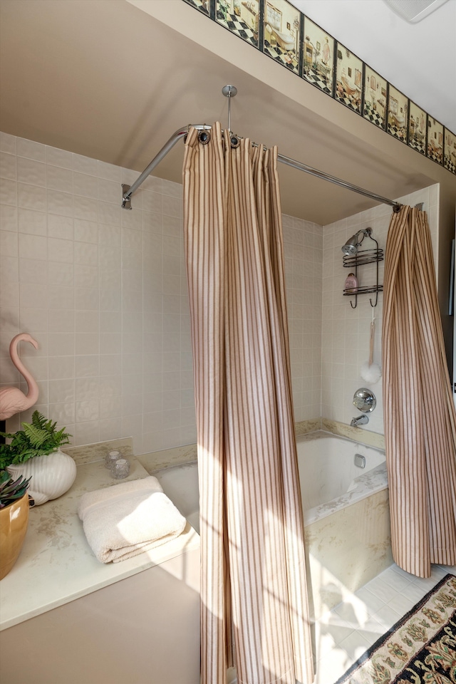 full bathroom featuring shower / bath combo with shower curtain