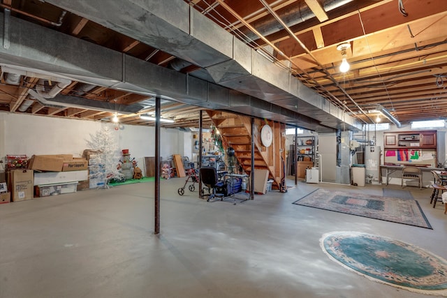 unfinished basement with water heater