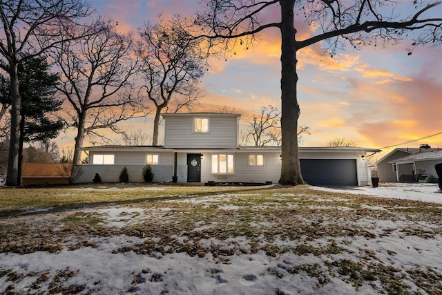 traditional home featuring an attached garage