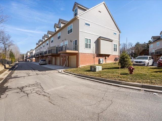 view of street with a residential view and curbs