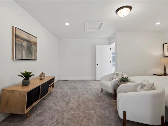 living room with attic access, carpet flooring, recessed lighting, and baseboards