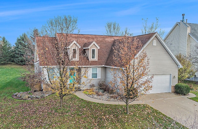 cape cod home featuring a garage, concrete driveway, and a front lawn