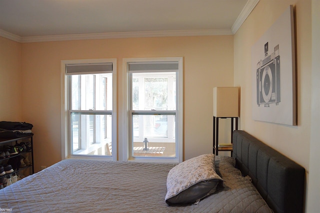 bedroom featuring crown molding