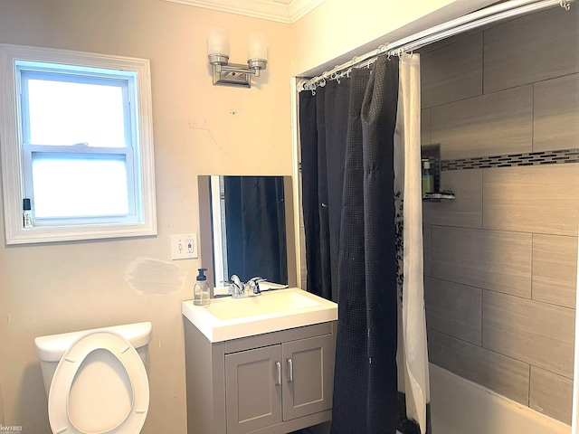 bathroom featuring shower / tub combo with curtain, toilet, and vanity